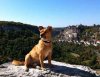 Juli, posing, at Rocamadour in France.