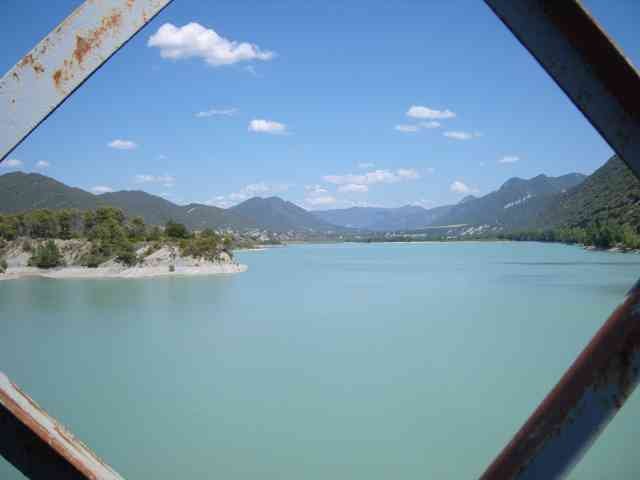 Looking through the old bridge, over the 'Embalse de la Pena', Huesca, Spain.